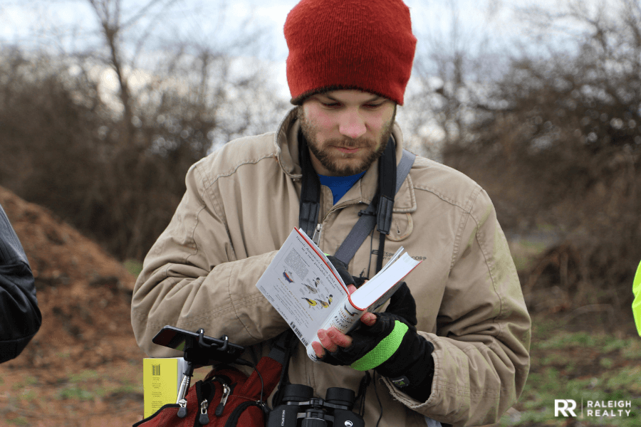 A professional bird researcher in the wild