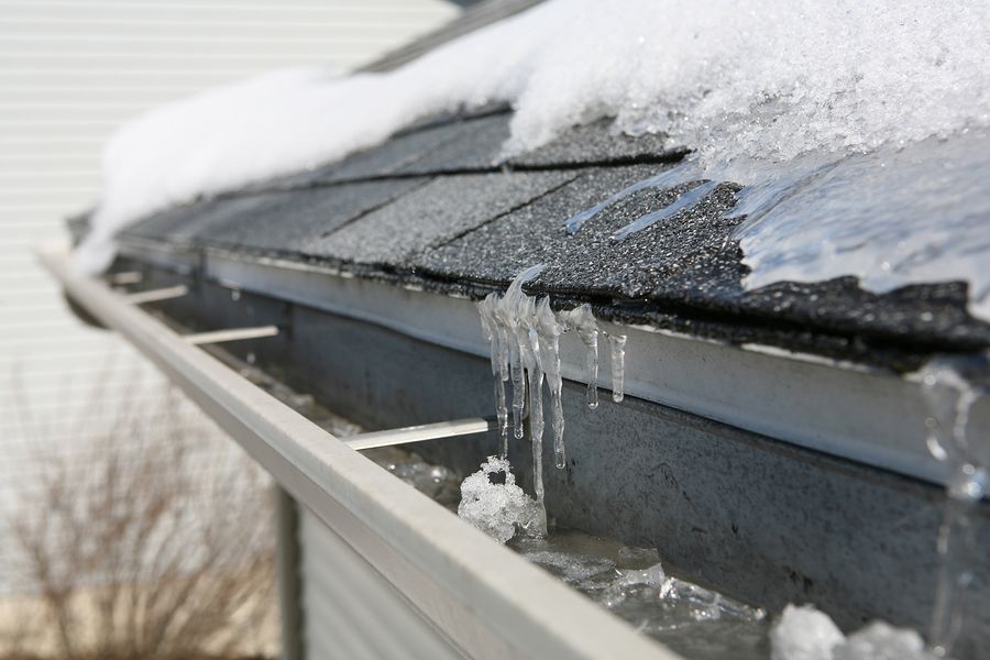 Ice on Roof Causes Damage and need for Repair