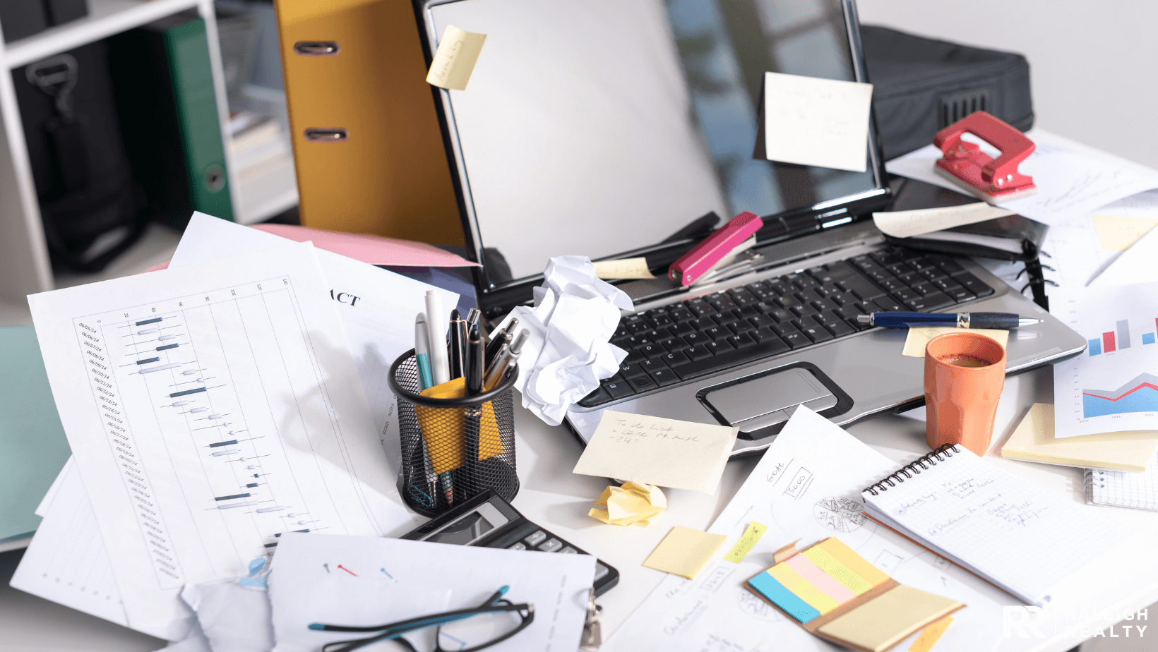 A messy office desk that needs serious organization