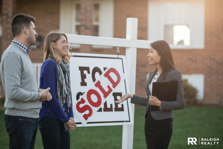 Real Estate Agent helping home buyers purchase their first home with success