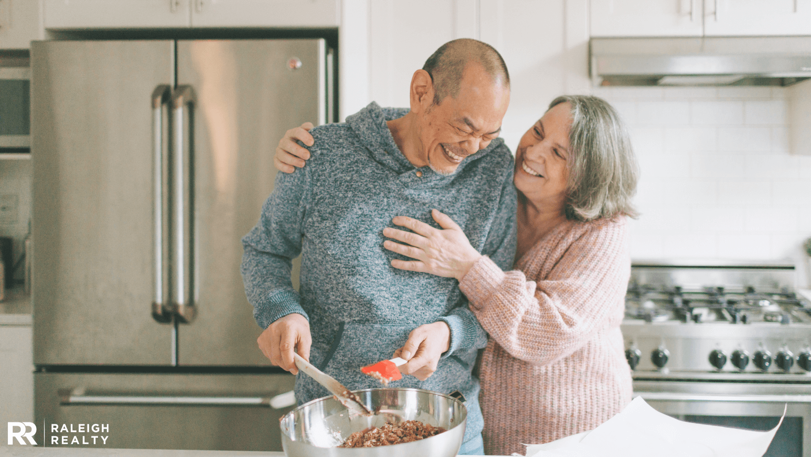 Seniors preparing food together in the kitchen