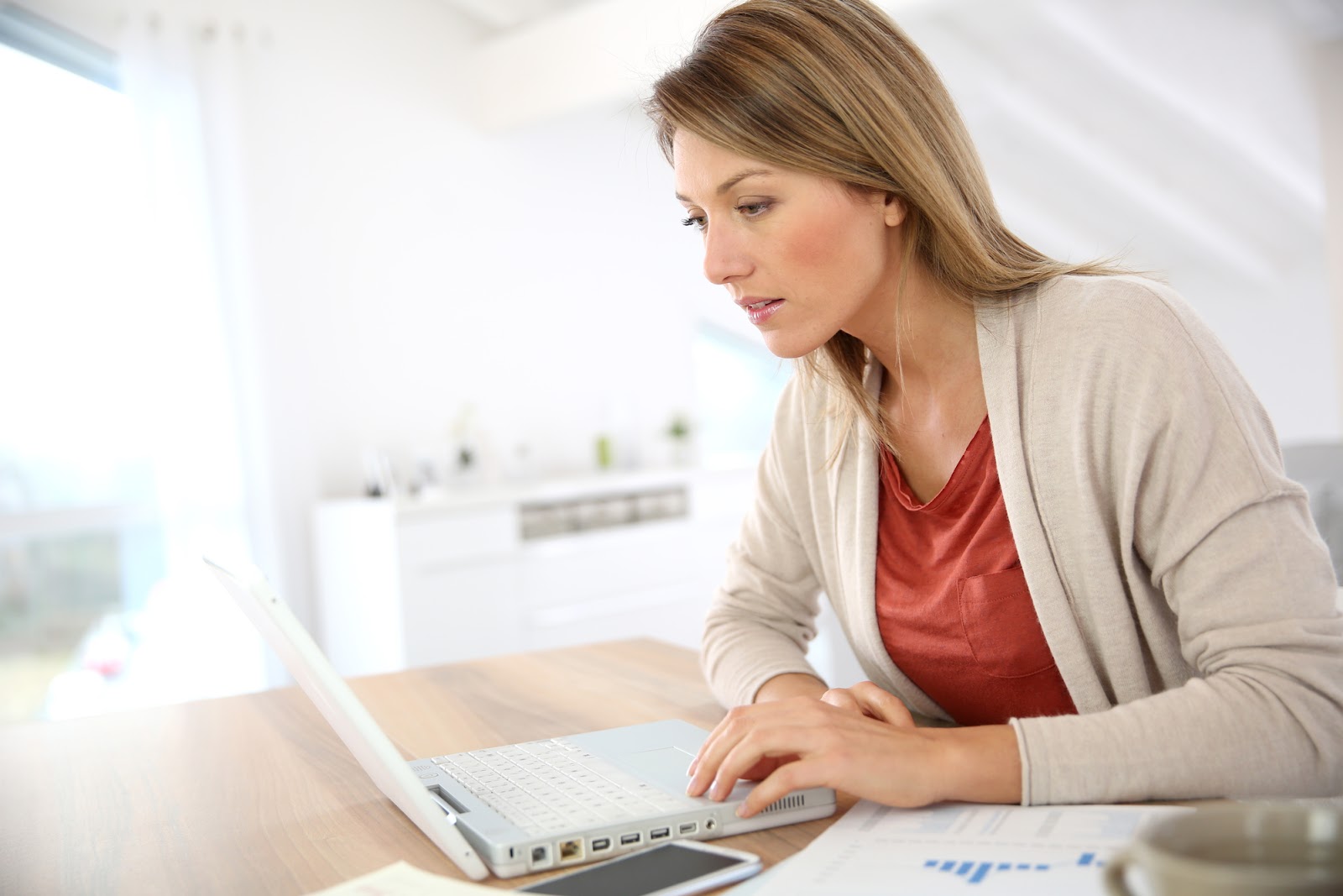 Woman working from home on her laptop