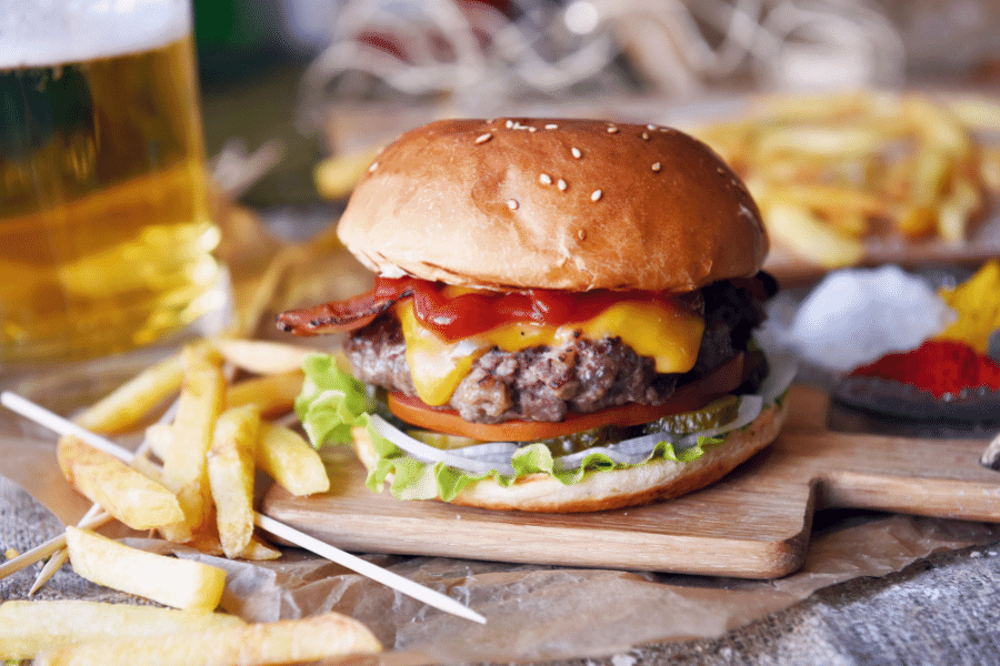 Cheeseburger with fries and beer 