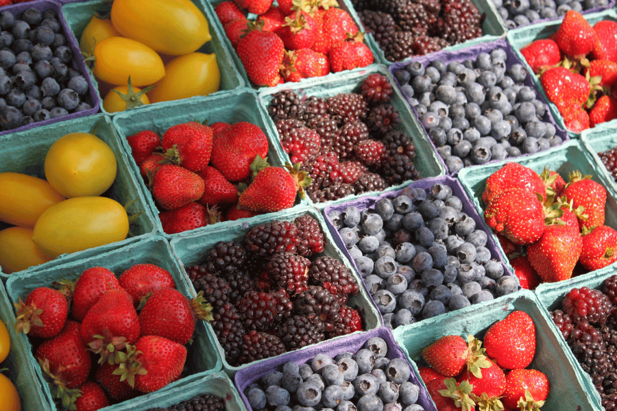 Fresh and colorful berries on sale at a farmers market 