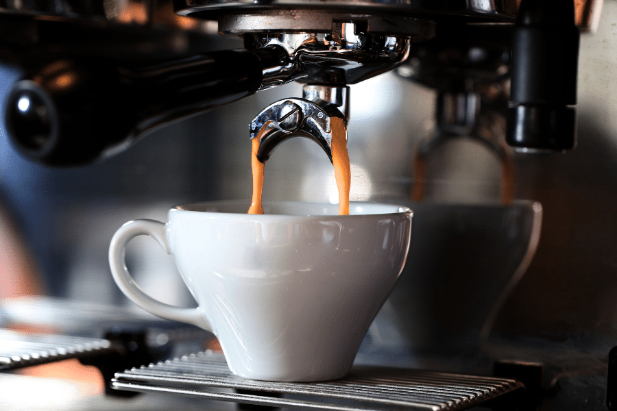 Brewing coffee in a white mug