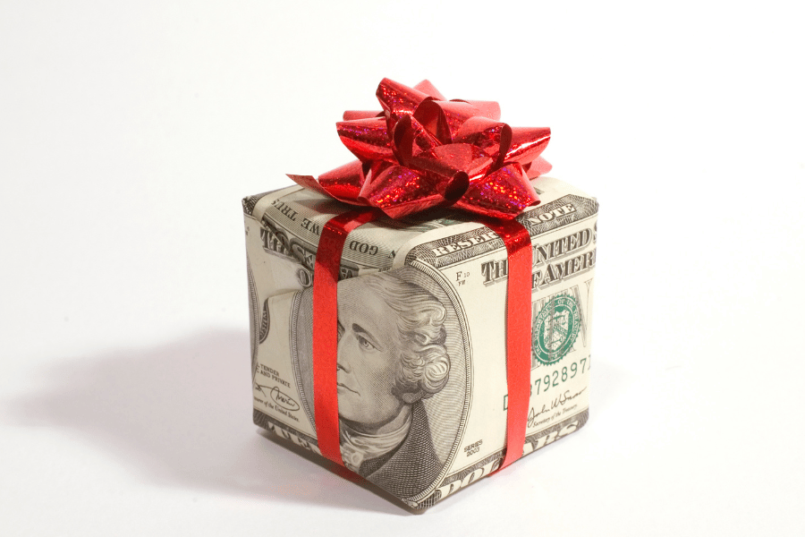 money wrapped up in a red bow 
