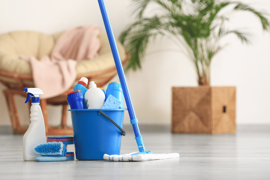 cleaning supplies in a bucket to use to help sell home faster