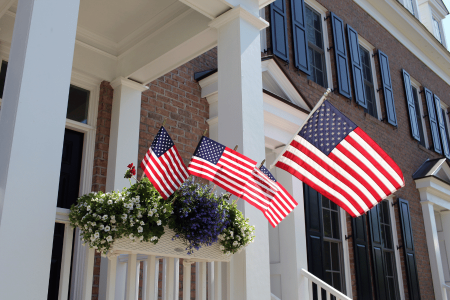 American flags decorating the front porch 