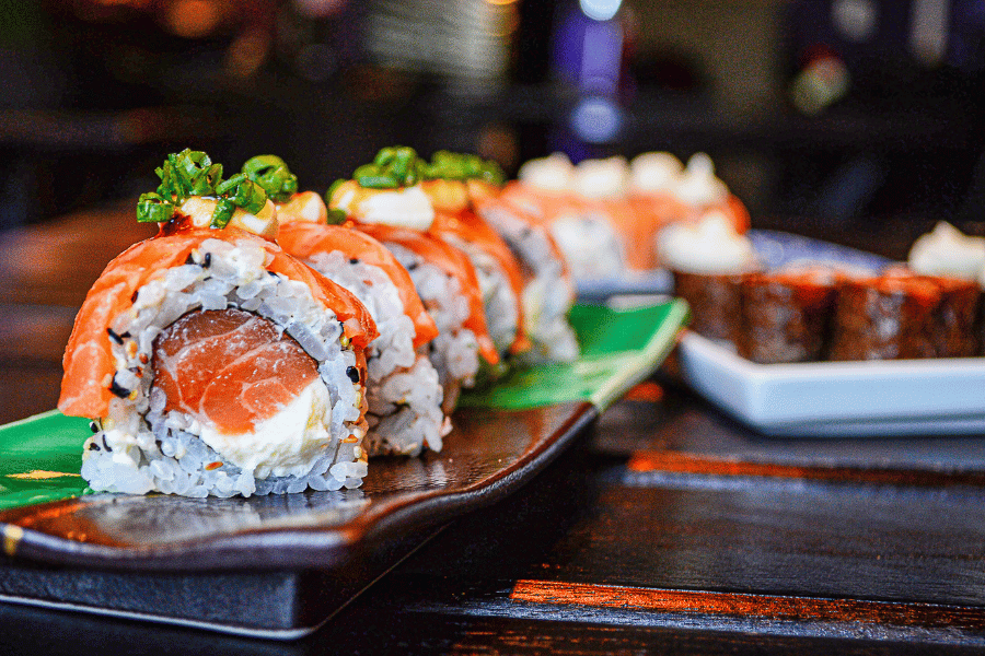 sushi rolls on wood boards 