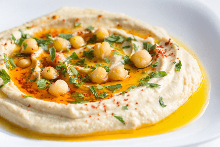 fresh made hummus with olive oil and chickpeas