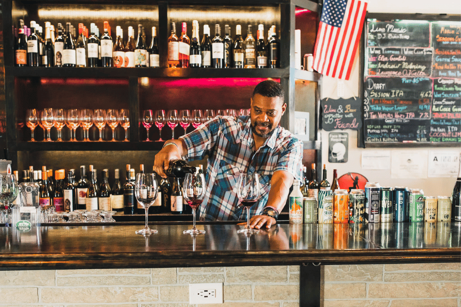 bartender pouring wine
