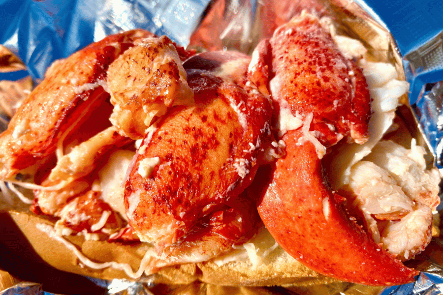 fresh lobster roll on a bun served from a food truck