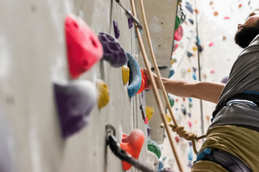 indoor rock climbing with harness