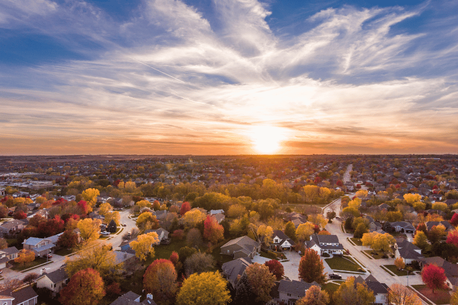 beautiful sunset over suburban community in the fall