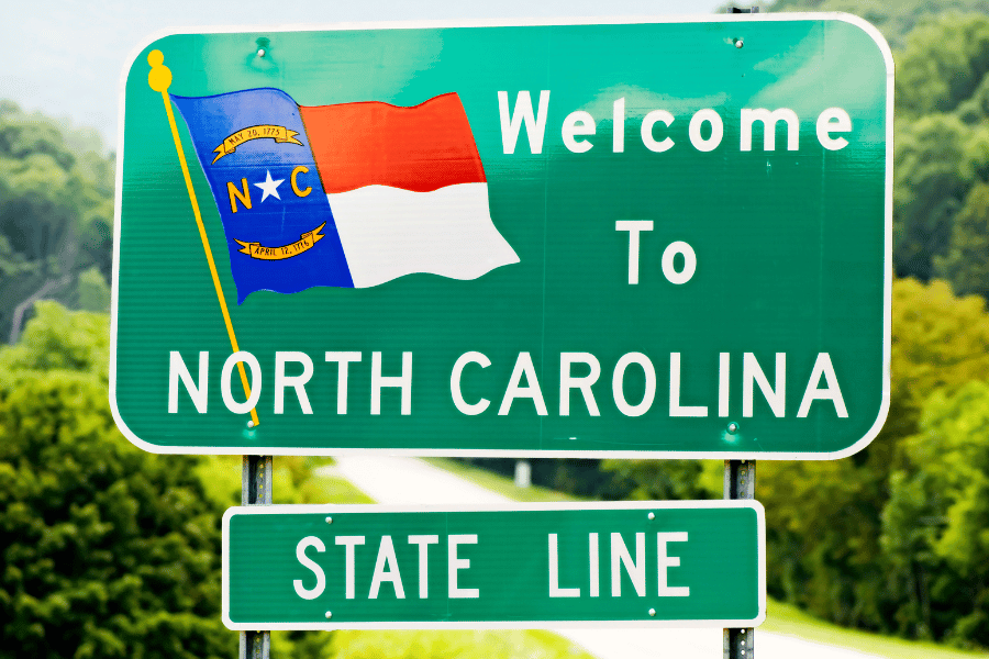 North Carolina state border sign on the road 