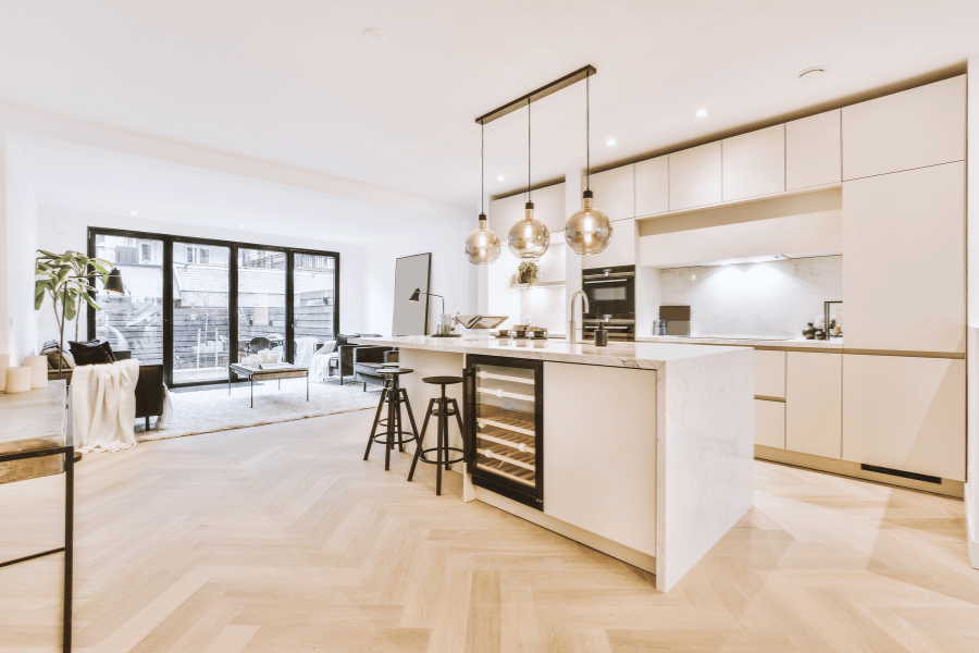 modern home with an open floor plan featuring black accents in the kitchen and living room