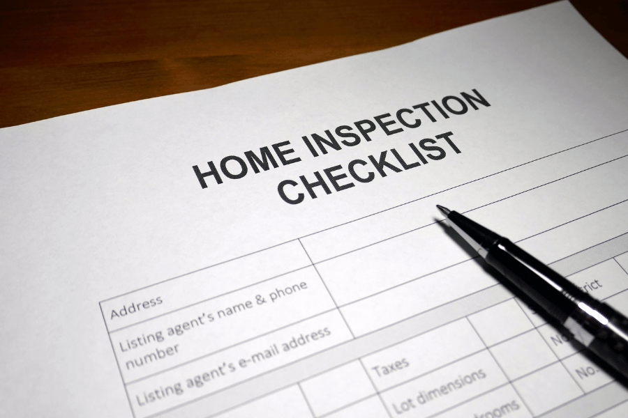 home inspection checklist with a pen 