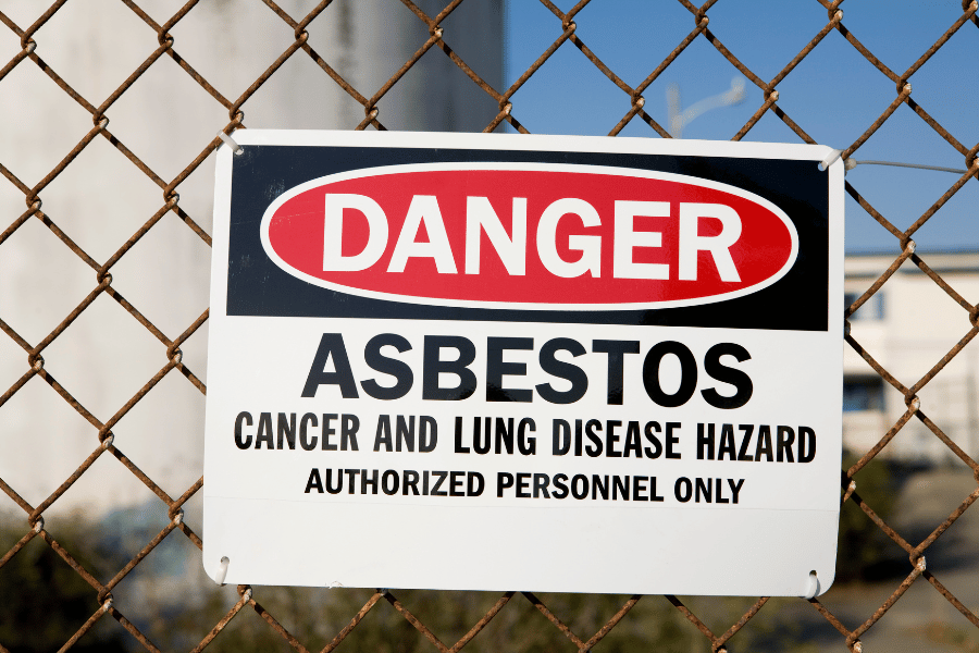 Asbestos danger sign on a fence 