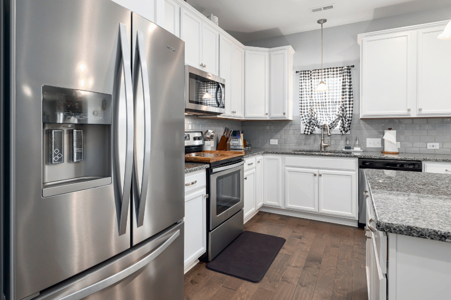renovated kitchen with updated appliances