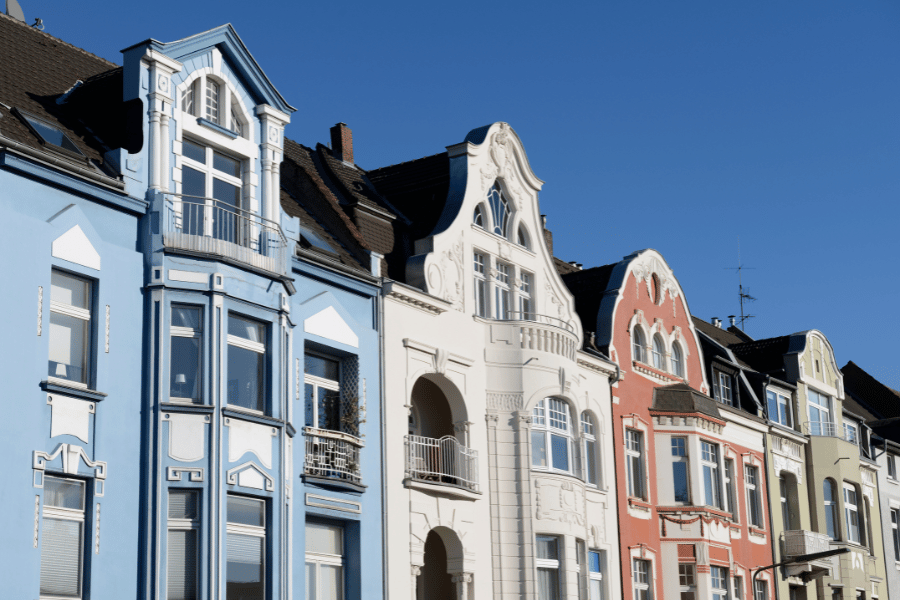 row of colorful townhomes