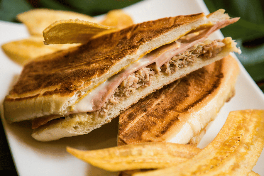 delicious cuban sandwich served with plantain chips