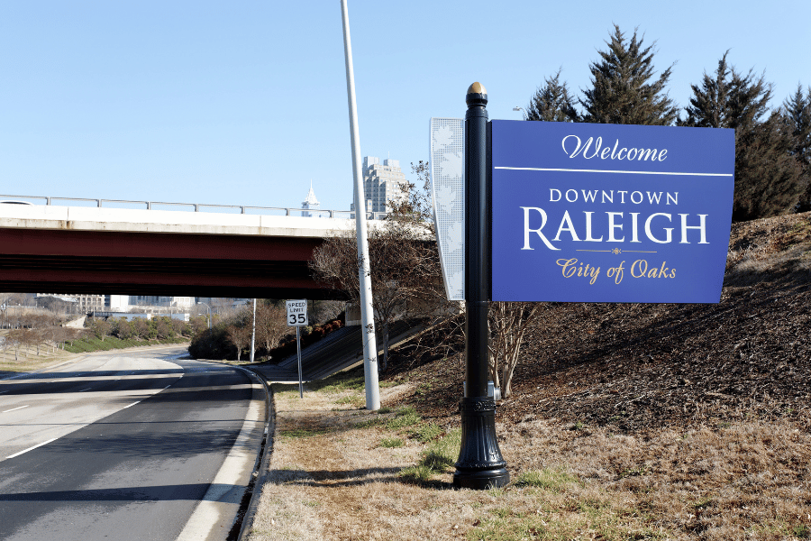 Blue Downtown Raleigh sign when entering the city 