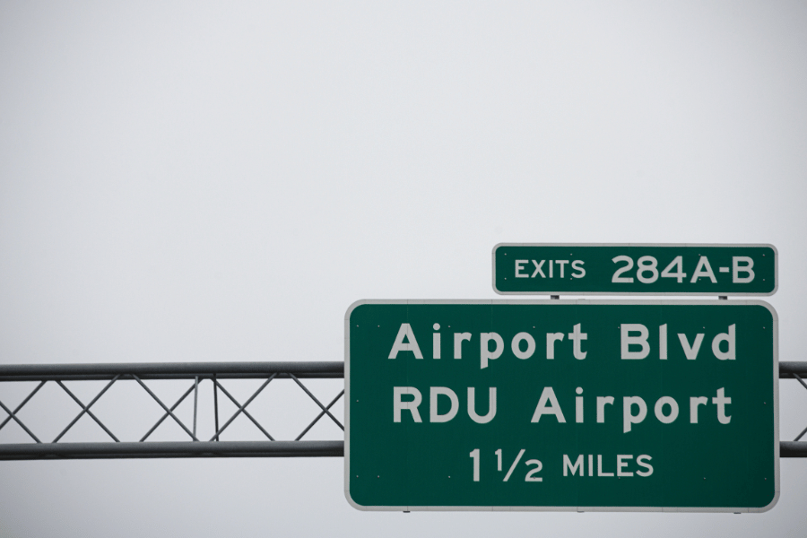 sign to the RDU Airport in Raleigh on the highway