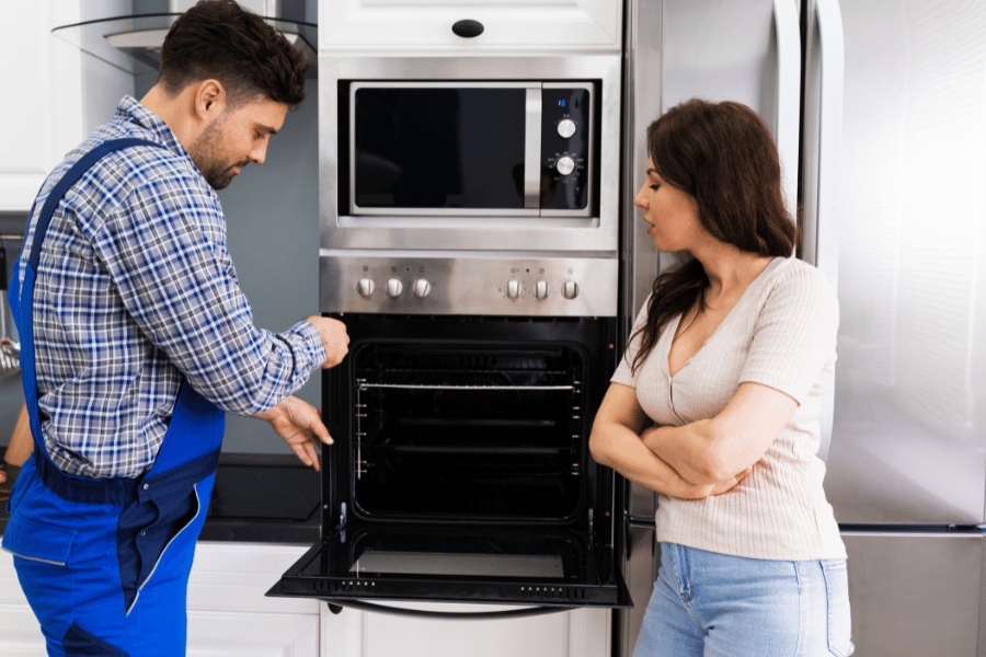 Talking with electrician about any oven issues in home