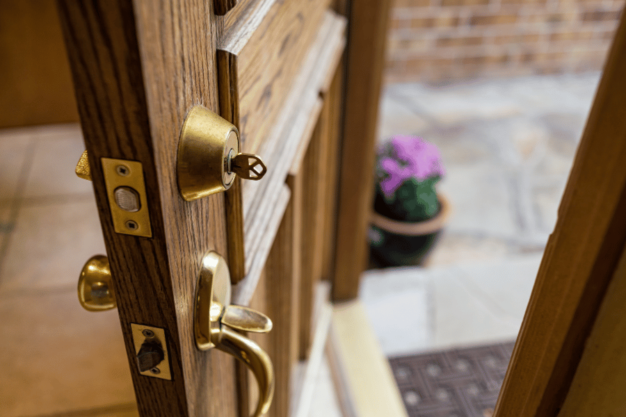 Key in lock of wood front door 