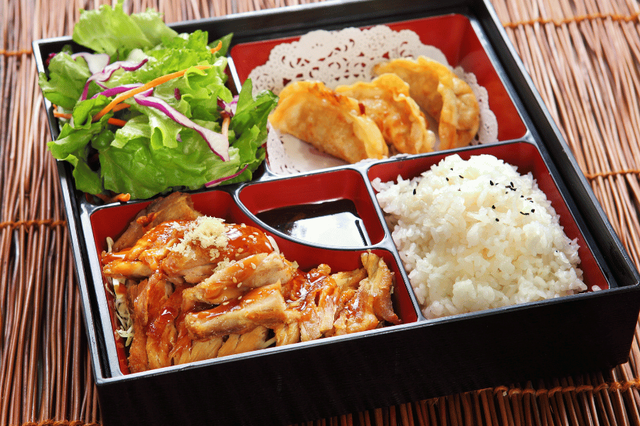 Bento Box meal with sushi and sides
