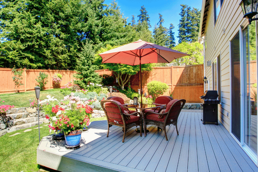 Beautiful backyard with a fence and deck