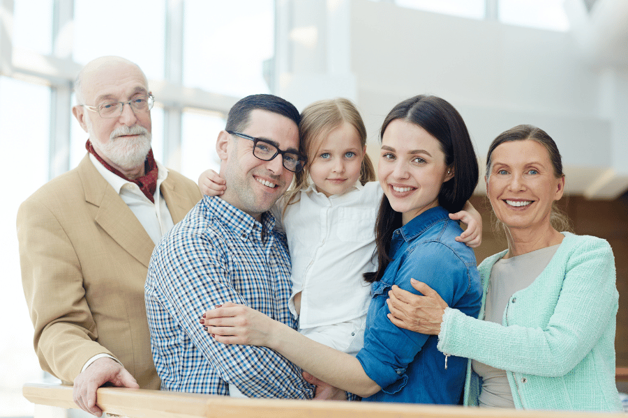 Family selling home success with a picture of the smiling family