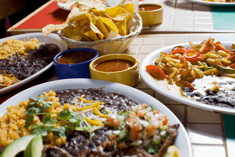 Mexican cuisine with rice, beans, and salsa