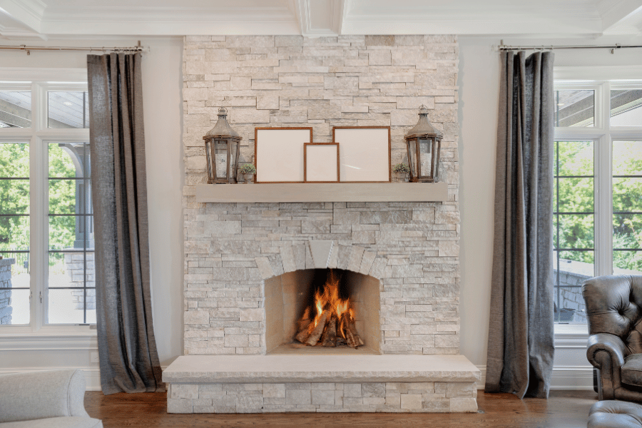 Beautiful living room wood burning fireplace in the fall