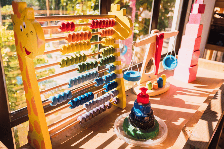 colorful educational toys on the windowsill at daycare