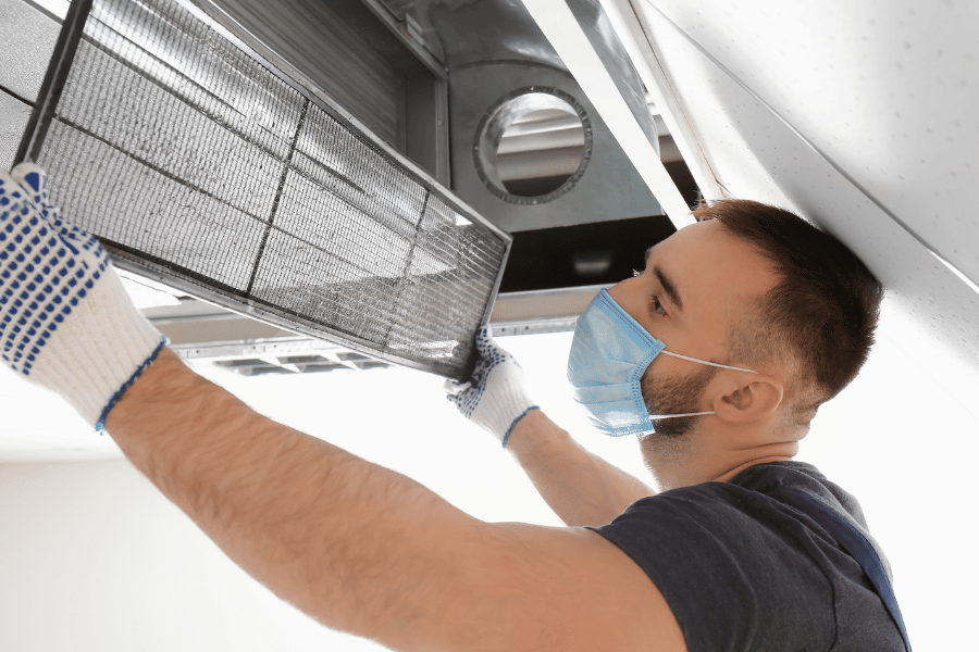 Cleaning the HVAC filter in home