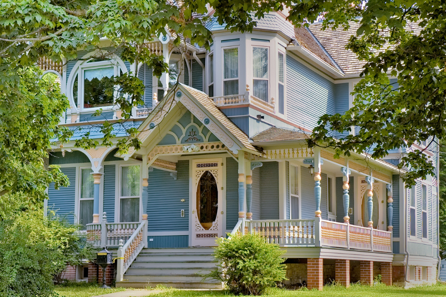 Blue Victorian Home with white front porch