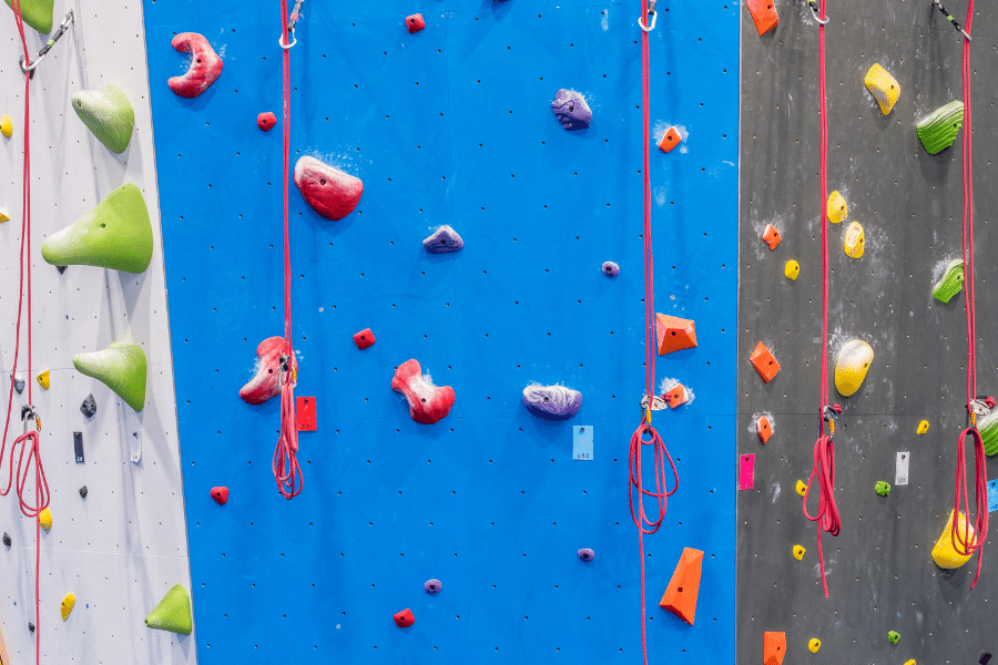 Rock climbing wall with ropes 