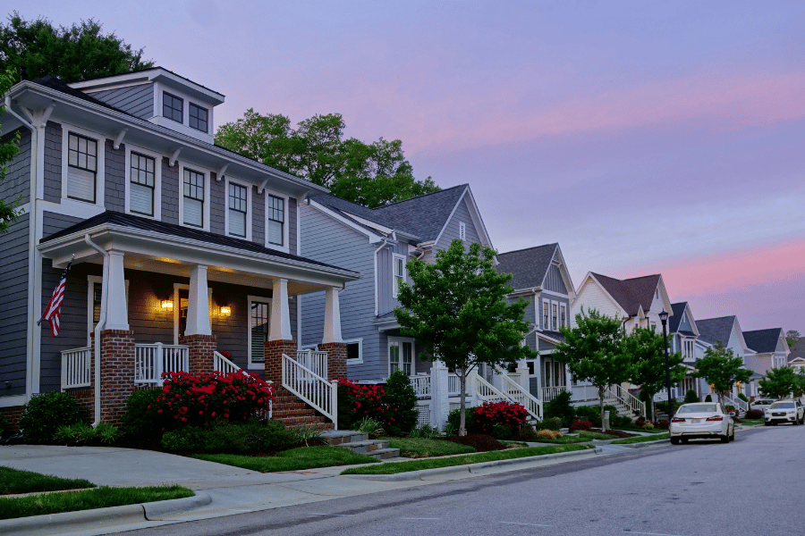 Quiet residential street in Raleigh, NC during pink sunset 