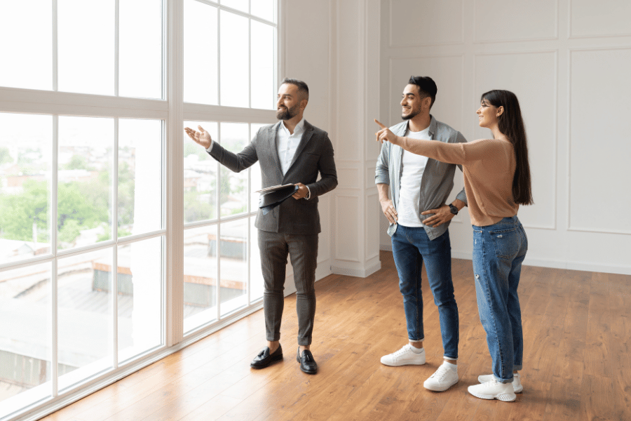 Viewing a home with potential home buyers with agent