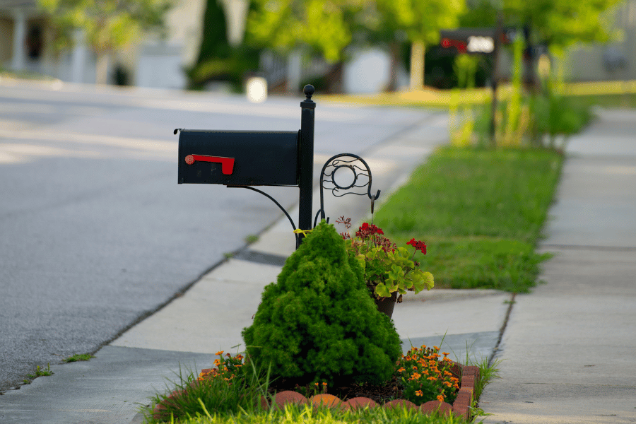 Mailbox with beautiful green grass and curb appeal