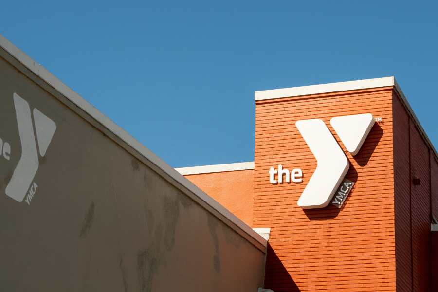 the YMCA building on a sunny day