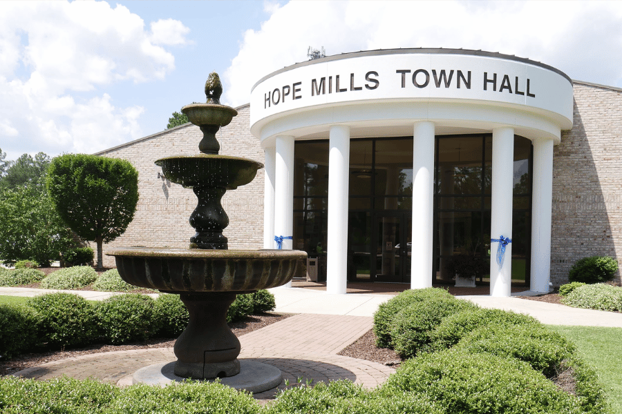 hope mills town hall with fountain